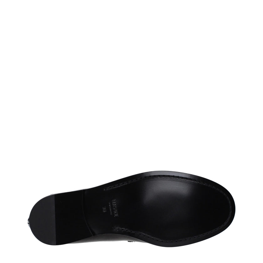 Black Leather Slip-On LoafersDescription: The product with MPN 10121231A087731B00V and code F82515 leather in black is a loafers designed by Versace. It has features like front detail, front logo. Additional Info: Style: Casual Shoe sole: Leather Shoe tip