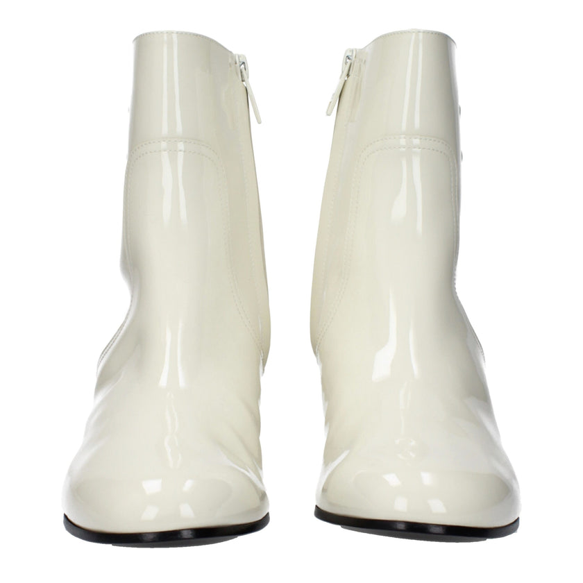 Beige Leather Ankle BootsDescription: The product with MPN 360484582C00WC and code F82549 patent leather in beige is a ankle boots designed by Celine. It has features like side logo. Additional Info: Style: Casual Closing type: Zip Closure Shoe sole: Leat