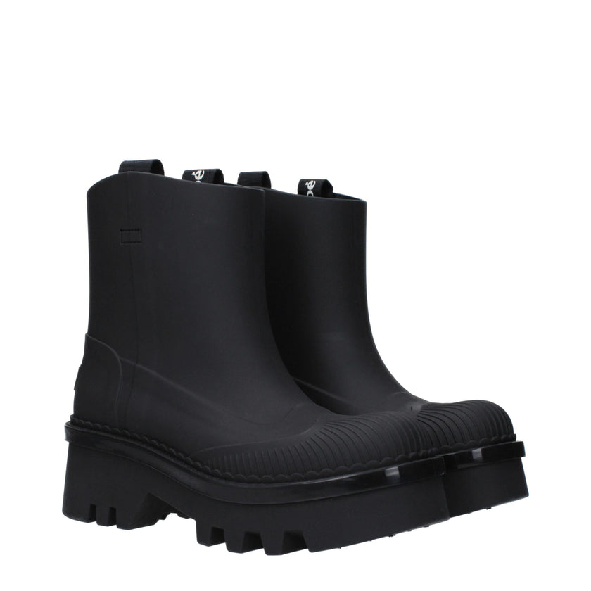 Black Cotton Ankle BootsDescription: The product with MPN CHC23A904FP001 and code F78589 rubber in black is a ankle boots designed by Chloé. It has features like back logo. Additional Info: Style: Street Materials: Rubber Shoe sole: Rubber Heel height: 5.