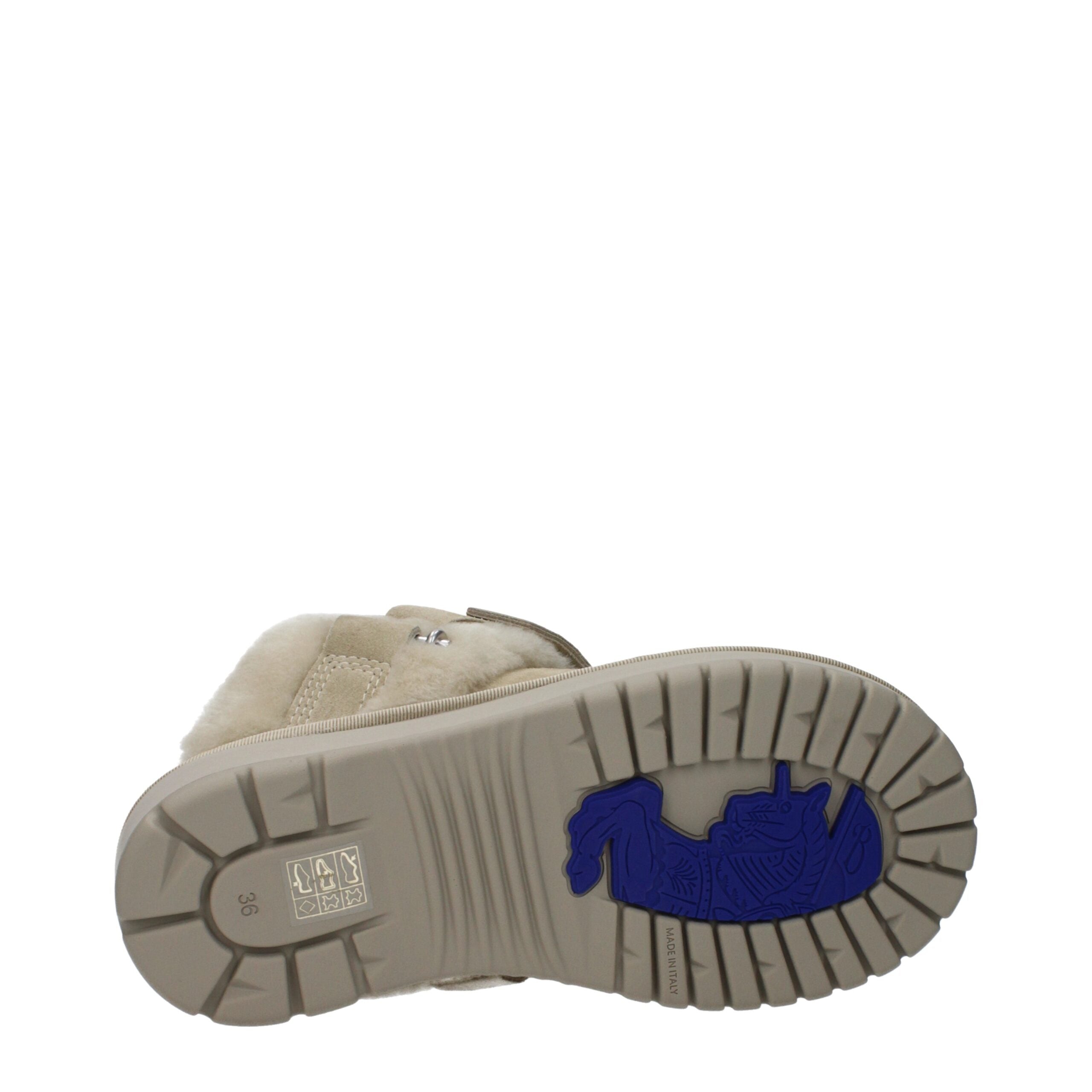 Green Leather SlippersDescription: The product with MPN 8095351 and code F82605 suede in green is a slippers and clogs designed by Burberry. It has features like fur detail. Additional Info: Style: Casual Closing type: Buckle Closure Shoe sole: Rubber Sho