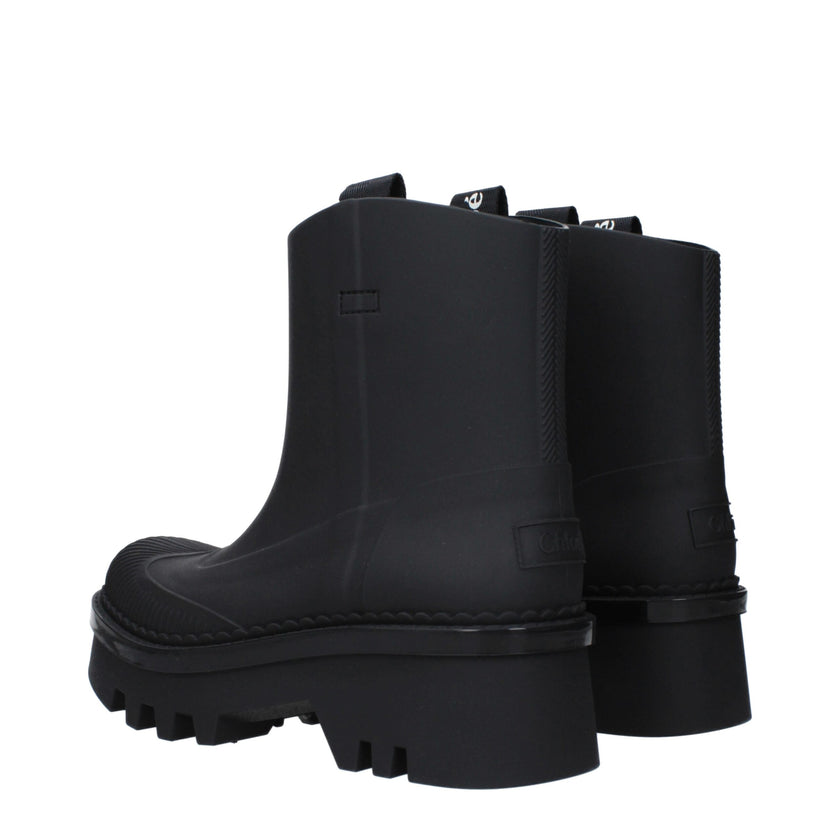 Black Cotton Ankle BootsDescription: The product with MPN CHC23A904FP001 and code F78589 rubber in black is a ankle boots designed by Chloé. It has features like back logo. Additional Info: Style: Street Materials: Rubber Shoe sole: Rubber Heel height: 5.