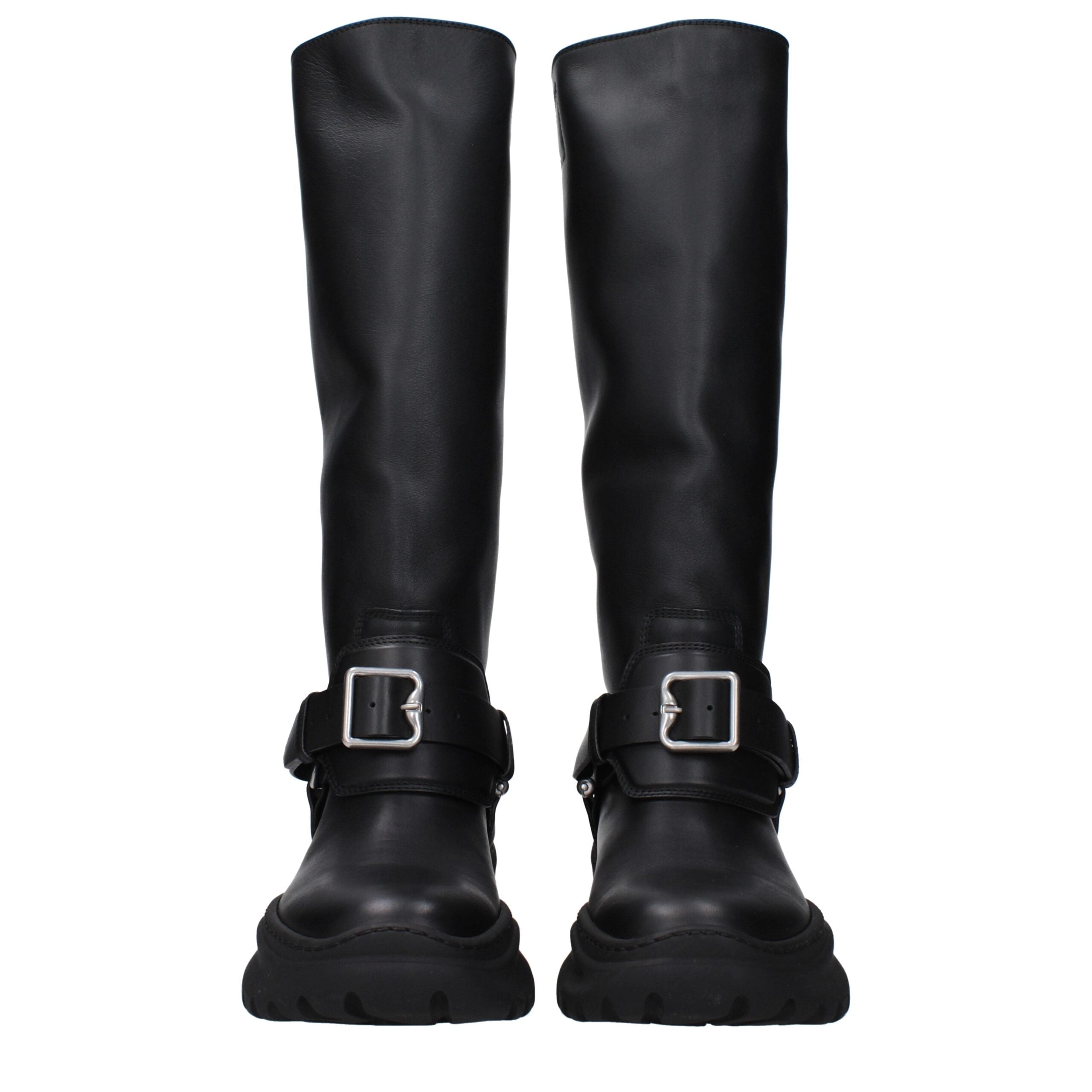 Black Leather BootsDescription: The product with MPN 8096904 and code F82616 leather in black is a boots designed by Burberry. It has features like front detail, vintage effect. Additional Info: Color details: Silver Style: Casual Materials: Leather Shoe