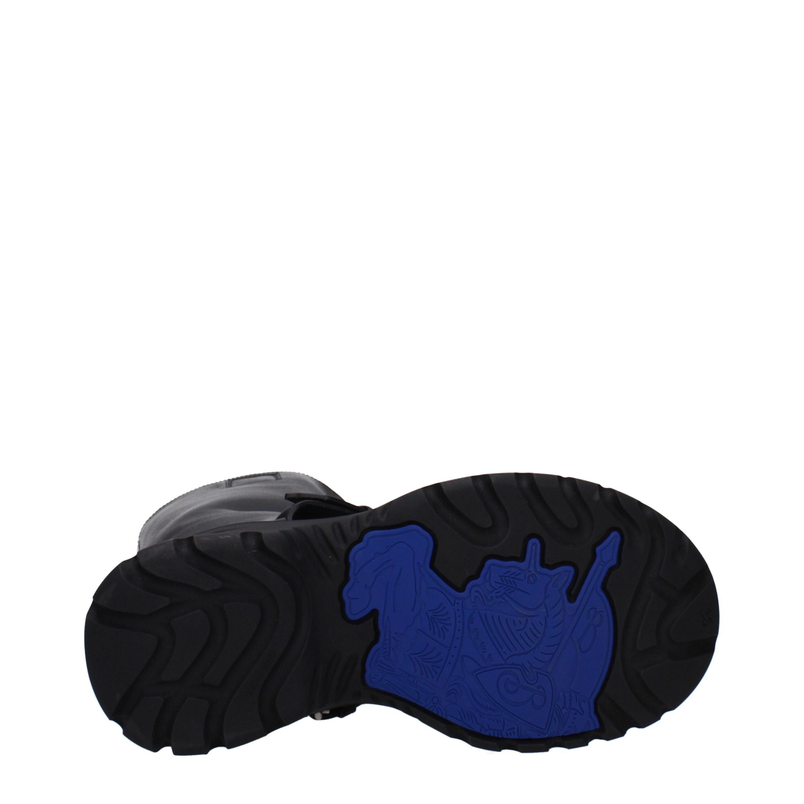 Black Leather BootsDescription: The product with MPN 8096904 and code F82616 leather in black is a boots designed by Burberry. It has features like front detail, vintage effect. Additional Info: Color details: Silver Style: Casual Materials: Leather Shoe