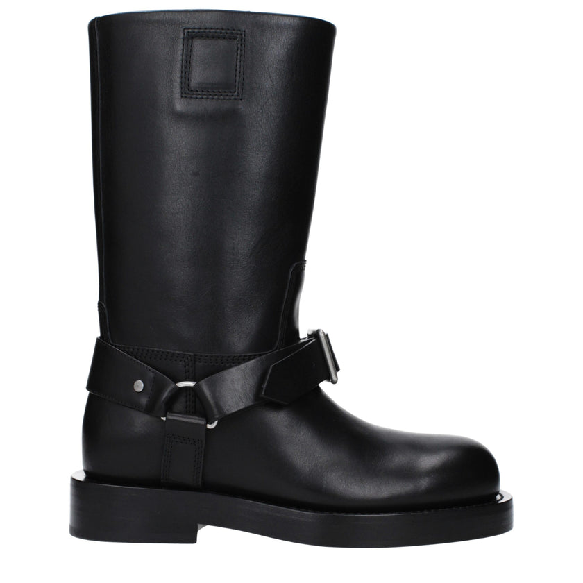Black Leather BootsDescription: The product with MPN 8077392 and code F82845 leather in black is a boots designed by Burberry. Additional Info: Style: Casual Closing type: Buckle Closure Shoe sole: Leather Heel height: 3.5 cm Shoe tip: Round toe Heel type