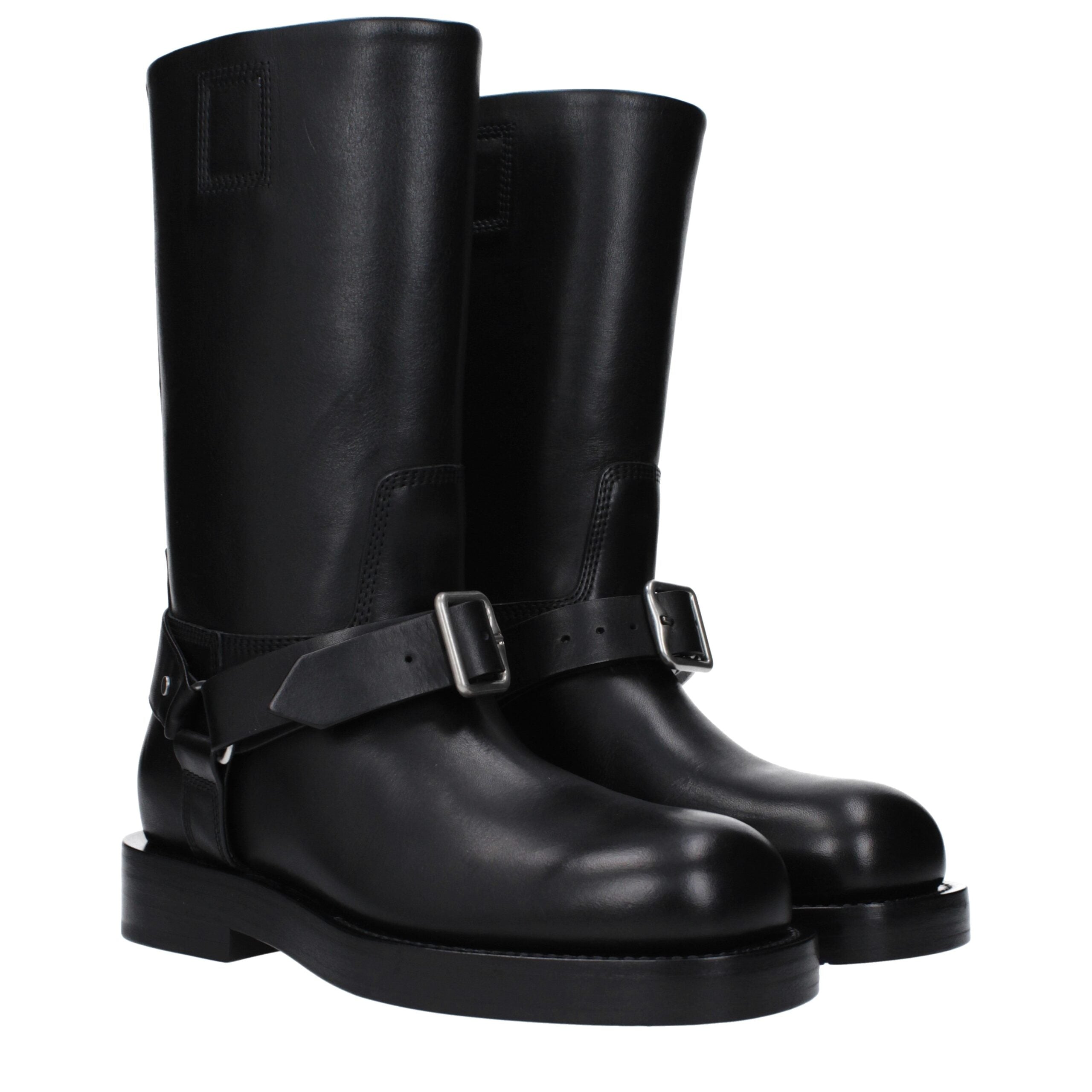 Black Leather BootsDescription: The product with MPN 8077392 and code F82845 leather in black is a boots designed by Burberry. Additional Info: Style: Casual Closing type: Buckle Closure Shoe sole: Leather Heel height: 3.5 cm Shoe tip: Round toe Heel type