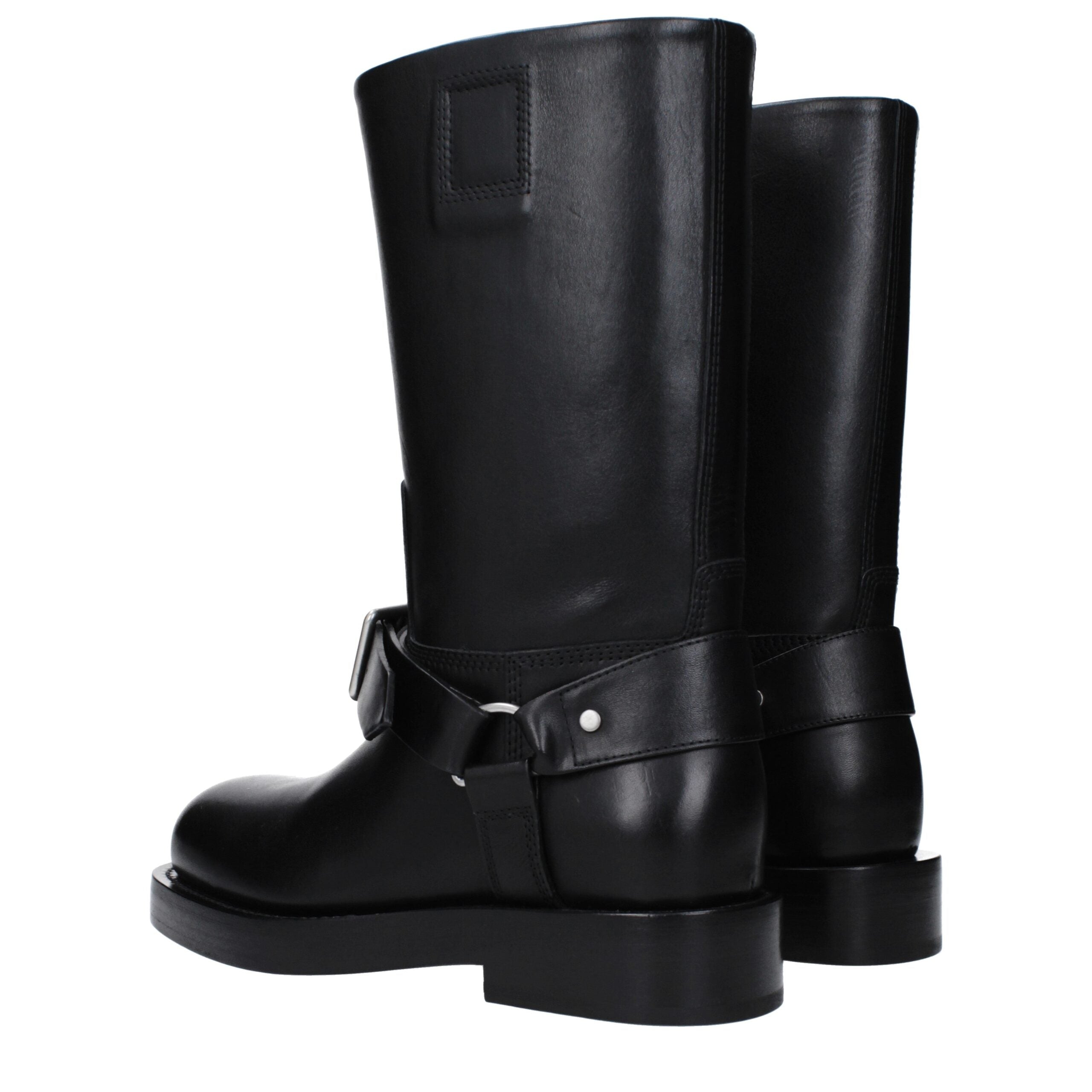Black Leather BootsDescription: The product with MPN 8077392 and code F82845 leather in black is a boots designed by Burberry. Additional Info: Style: Casual Closing type: Buckle Closure Shoe sole: Leather Heel height: 3.5 cm Shoe tip: Round toe Heel type