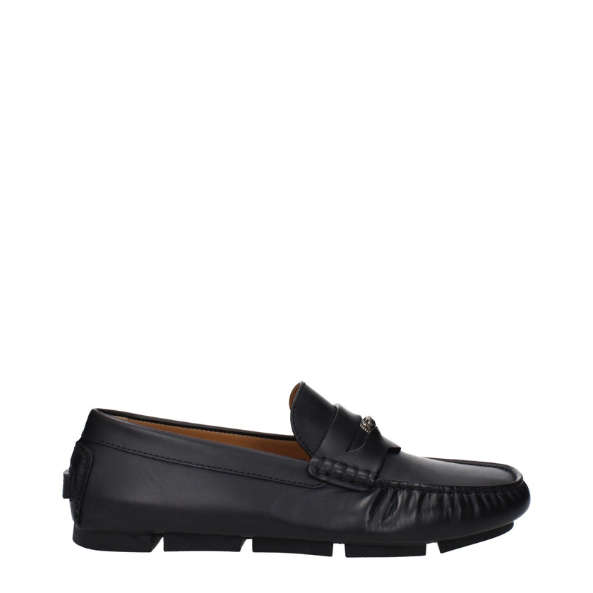 Black Leather Slip-On LoafersDescription: The product with MPN 10139601A006931B00E and code F82958 leather in black is a loafers designed by Versace. It has features like back logo, front detail. Additional Info: Color details: Gold Style: Stylish Materia