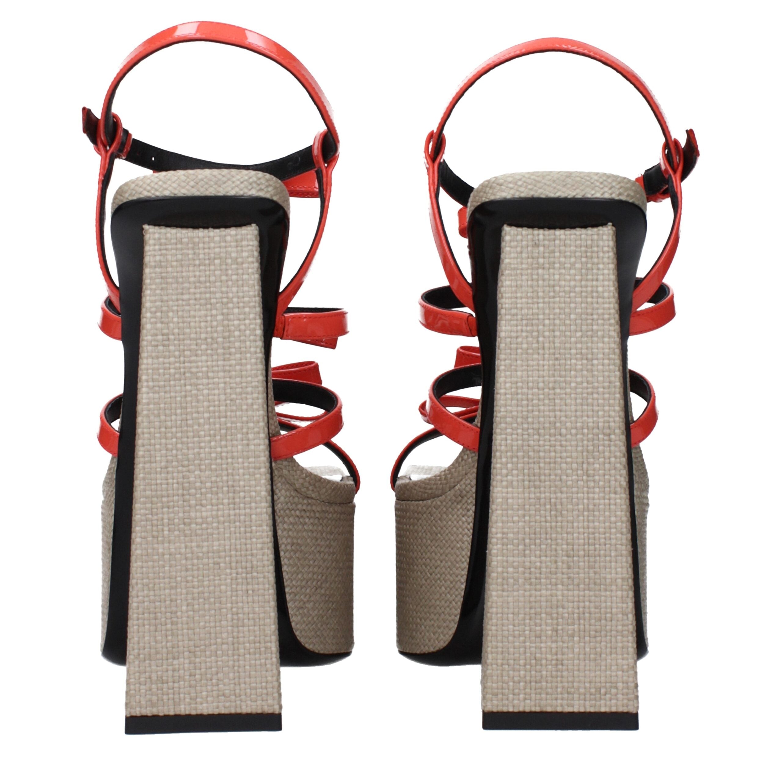 Orange Leather Platform SandalsDescription: The product with MPN 10154281A109841RA8P and code F83438 patent leather in orange is a sandals designed by Versace. It has features like front logo.Orange Leather Platform Sandals${tagsVersaceAulae Orange Leathe