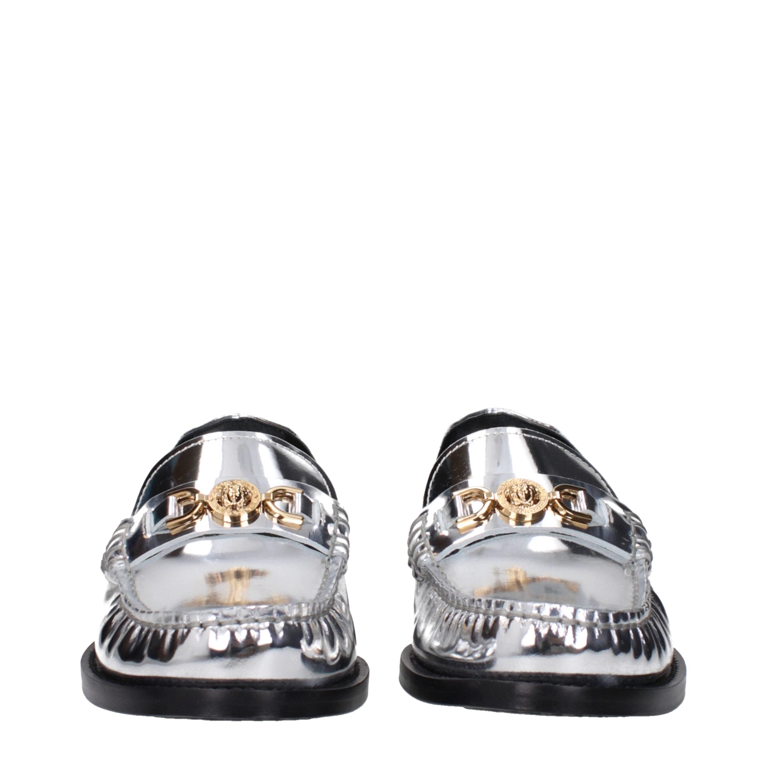 Gray Leather Slip-On LoafersDescription: The product with MPN 10121231A043021E01V and code F83780 leather in silver is a loafers designed by Versace. It has features like front logo, metallic effect. Additional Info: Style: Casual Shoe sole: Leather Shoe