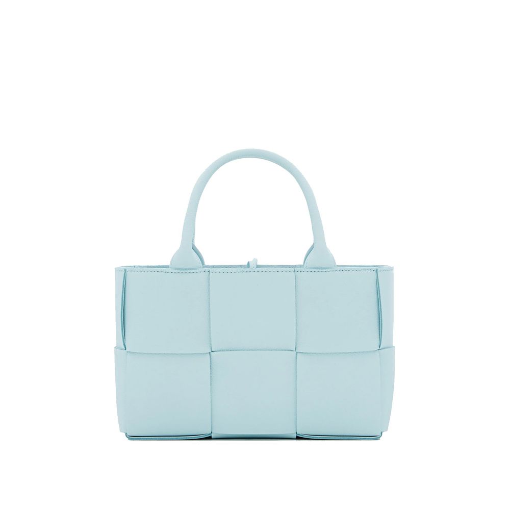 Blue Lamb Leather Tote BagDescription: – Composition: 100% Lamb Leather – Two top handles – Internal leather pouch – Unlined – Brand’s signature Intrecciato weave – Closed with drawcords – Made in Italy – Gender: WOMEN – Size & Fit: Height 16,5cm, Lenght