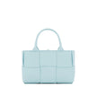 Blue Lamb Leather Tote BagDescription: – Composition: 100% Lamb Leather – Two top handles – Internal leather pouch – Unlined – Brand’s signature Intrecciato weave – Closed with drawcords – Made in Italy – Gender: WOMEN – Size & Fit: Height 16,5cm, Lenght