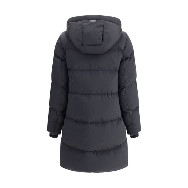 Black Goose Down CoatThe Kelly Down Jacket by Woolrich combines practicality and contemporary style. Featuring elastic cuffs and a hood, it features a front zipper and button closure, zippered side slits and two welt pockets. The padded and quilted design