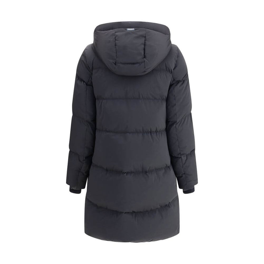 Black Goose Down CoatThe Kelly Down Jacket by Woolrich combines practicality and contemporary style. Featuring elastic cuffs and a hood, it features a front zipper and button closure, zippered side slits and two welt pockets. The padded and quilted design