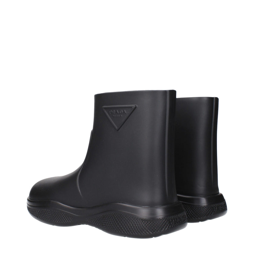 Black Cotton Ankle BootsDescription: The product with MPN 1T859M3LKD025F0002 and code F83672 rubber in black is a ankle boots designed by Prada. It has features like side logo, back logo. Additional Info: Style: Casual Shoe sole: Rubber Shoe tip: Round to