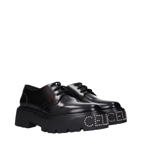 Black Leather Oxfords And DerbiesDescription: The product with MPN 353303602C38NO and code F83851 leather in black is a lace up and monkstrap designed by Celine. It has features like front logo, back logo.Black Leather Oxfords And Derbies${tagsCelineAulae