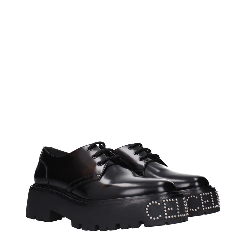 Black Leather Oxfords And DerbiesDescription: The product with MPN 353303602C38NO and code F83851 leather in black is a lace up and monkstrap designed by Celine. It has features like front logo, back logo.Black Leather Oxfords And Derbies${tagsCelineAulae