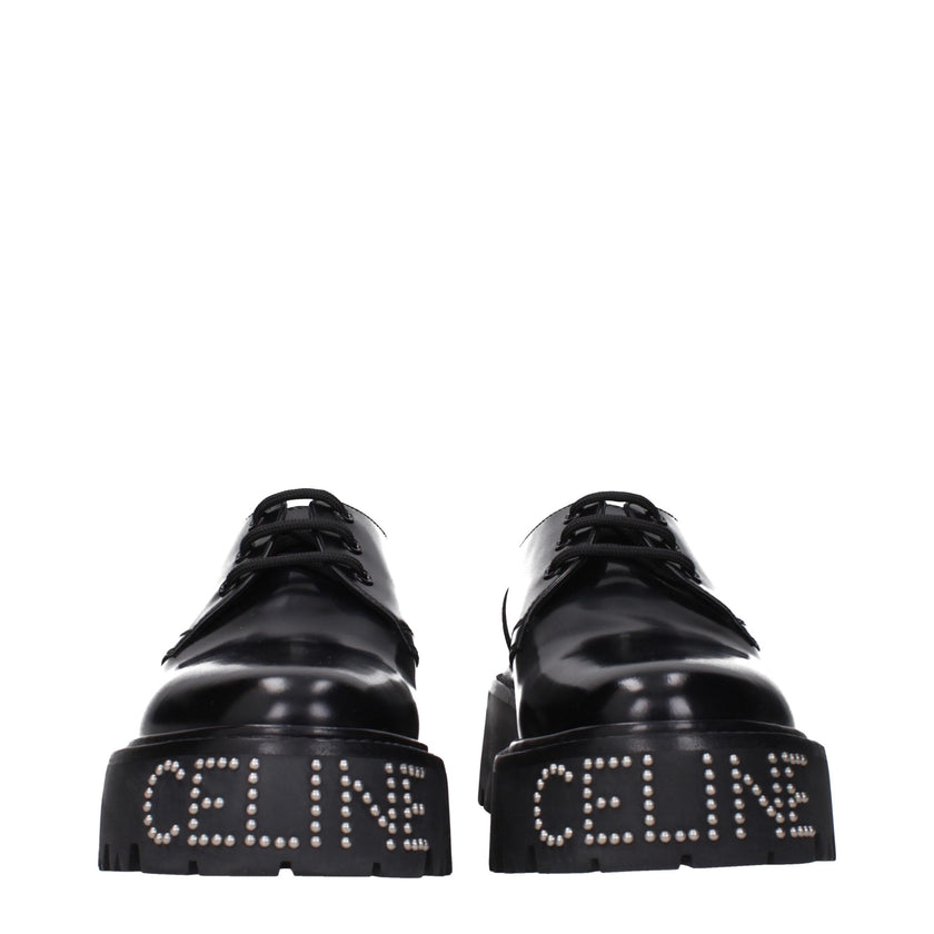 Black Leather Oxfords And DerbiesDescription: The product with MPN 353303602C38NO and code F83851 leather in black is a lace up and monkstrap designed by Celine. It has features like front logo, back logo.Black Leather Oxfords And Derbies${tagsCelineAulae