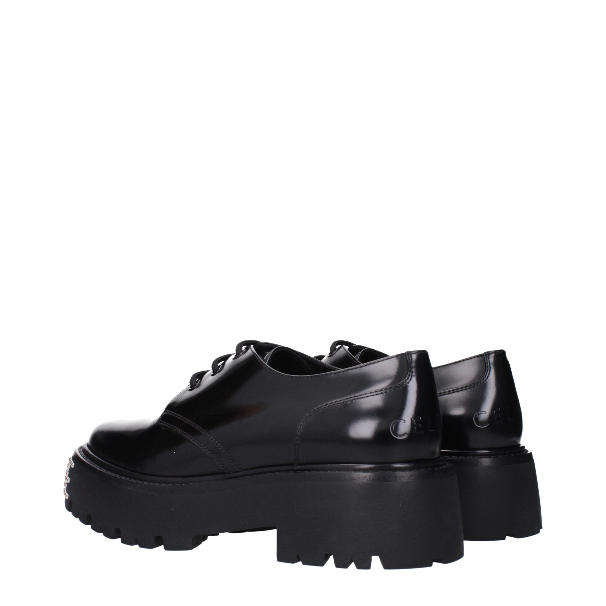 Black Leather Oxfords And DerbiesDescription: The product with MPN 353303602C38NO and code F83851 leather in black is a lace up and monkstrap designed by Celine. It has features like front logo, back logo.Black Leather Oxfords And Derbies${tagsCelineAulae
