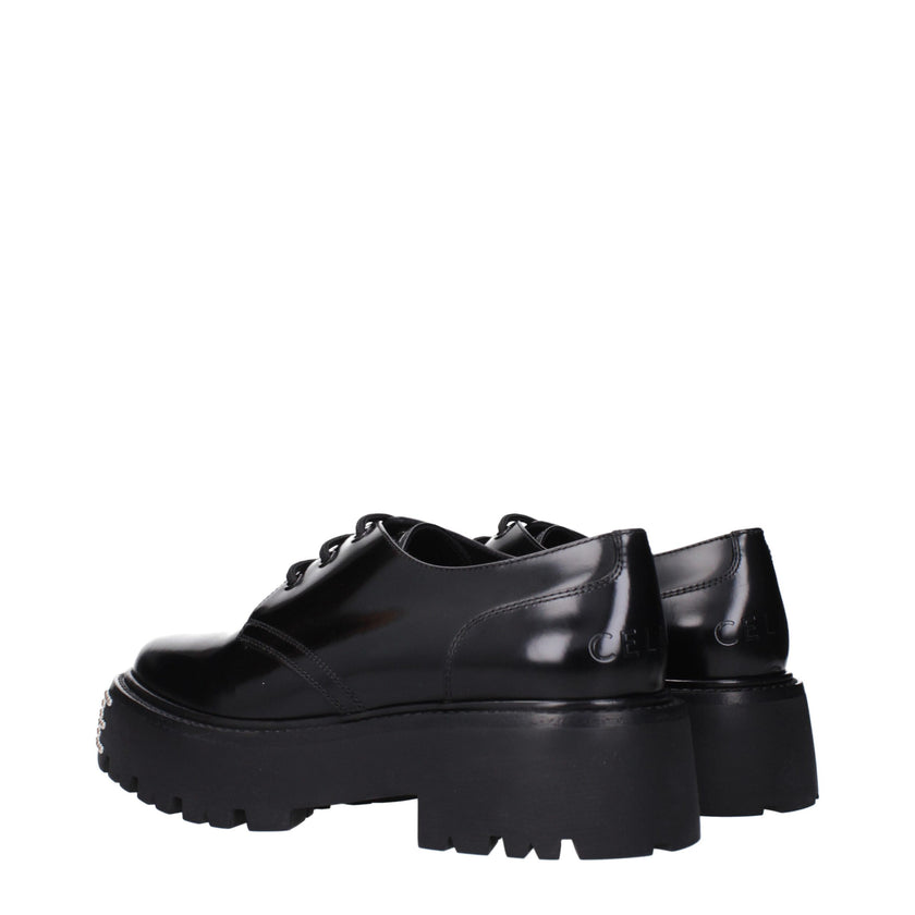 Black Leather Oxfords And DerbiesDescription: The product with MPN 353303602C38NO and code F83851 leather in black is a lace up and monkstrap designed by Celine. It has features like front logo, back logo.Black Leather Oxfords And Derbies${tagsCelineAulae