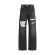 Black Cotton Relaxed Fit JeansMid-rise Jeans by Versace, made of pure cotton and featuring a five-pocket design. The model is distinguished by cut-out details on the front, embellished with applied gold metallic mesh inserts, which add a bold and contempo
