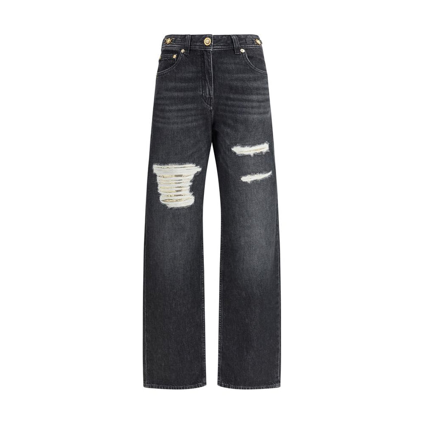 Black Cotton Relaxed Fit JeansMid-rise Jeans by Versace, made of pure cotton and featuring a five-pocket design. The model is distinguished by cut-out details on the front, embellished with applied gold metallic mesh inserts, which add a bold and contempo