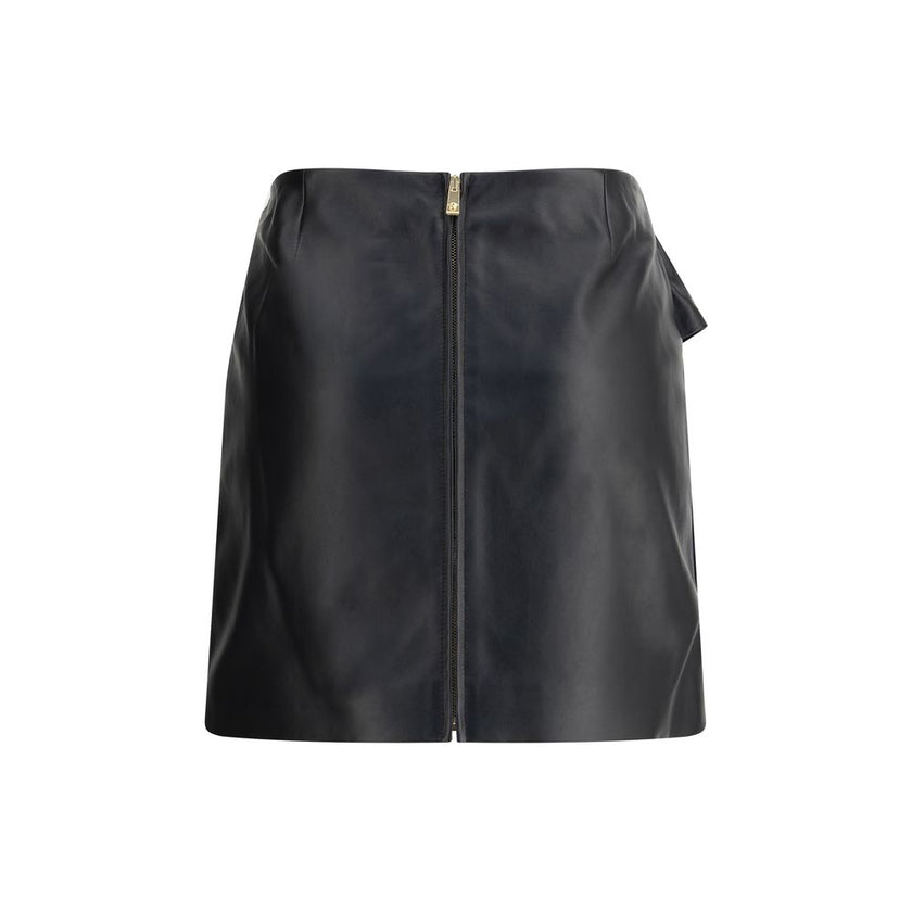 Black Lamb Ovis Aries Aries Mini SkirtThe Versace lambskin Miniskirt is a bold and sophisticated piece, enriched by an elegant decorative knot on the front that adds dynamism to the design. Crafted from soft leather, it features a zip fastening on the bac