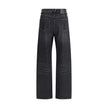 Black Cotton Relaxed Fit JeansMid-rise Jeans by Versace, made of pure cotton and featuring a five-pocket design. The model is distinguished by cut-out details on the front, embellished with applied gold metallic mesh inserts, which add a bold and contempo