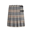 Gray Wool Mini SkirtBurberry’s Check Archive Wool Miniskirt features a flared silhouette with pleats that give it movement and femininity. The waist is finished with short, thin bangs, while leather straps with a B-shaped buckle allow for tailored adjustm
