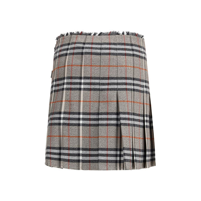 Gray Wool Mini SkirtBurberry’s Check Archive Wool Miniskirt features a flared silhouette with pleats that give it movement and femininity. The waist is finished with short, thin bangs, while leather straps with a B-shaped buckle allow for tailored adjustm