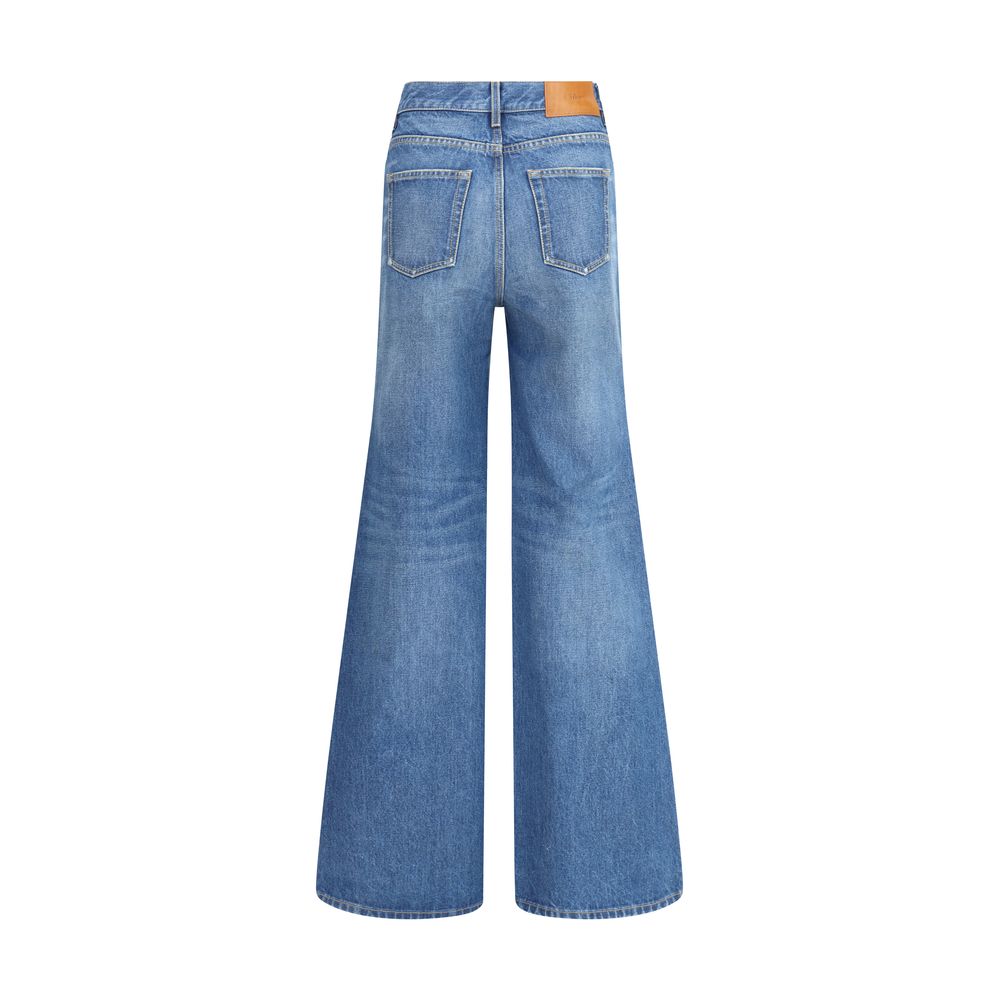 Blue Cotton Flared JeansChloé’s Flare Jeans are an iconic garment that reinterprets a classic with a touch of contemporary elegance. Featuring a traditional five-pocket pattern, they offer functionality and timeless style. The high waist slims the figure