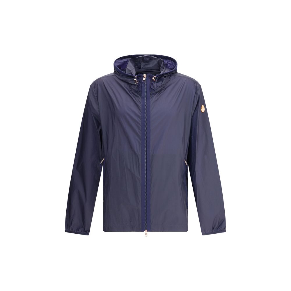 Blue Nylon Shell JacketMoncler x Gilga Farm di Donald Glover Hamlin waterproof Jacket made of ripstop nylon, a highly resistant and water-repellent technical fabric, perfect for tackling variable weather conditions. It features a high collar with adjustab