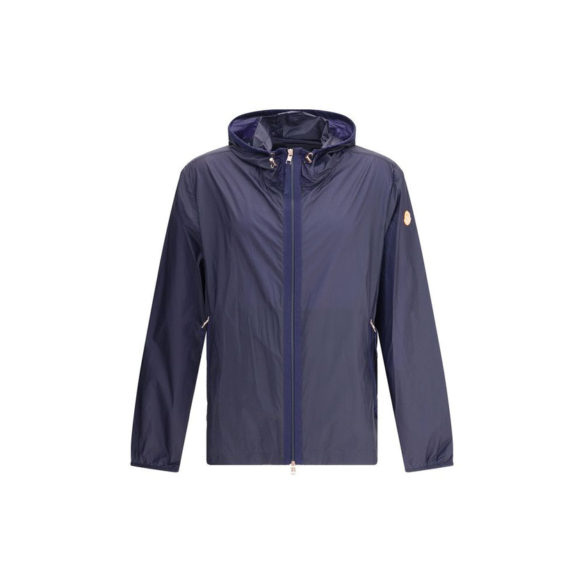 Blue Nylon Shell JacketMoncler x Gilga Farm di Donald Glover Hamlin waterproof Jacket made of ripstop nylon, a highly resistant and water-repellent technical fabric, perfect for tackling variable weather conditions. It features a high collar with adjustab