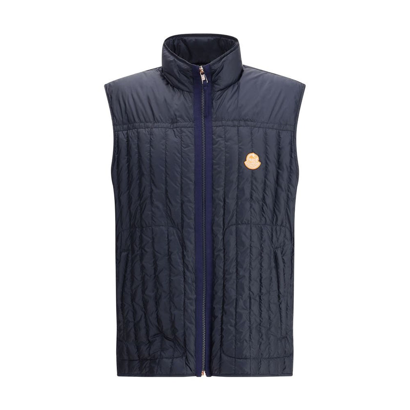 Blue Polyamide Sleveless JacketThe Moncler x Gilga Farm Down Vest by Donald Glover, named Tangerine after the orange groves of Gilga Farm, combines lightness and functionality. Crafted from longue saison, a lightweight and protective nylon, it features wa