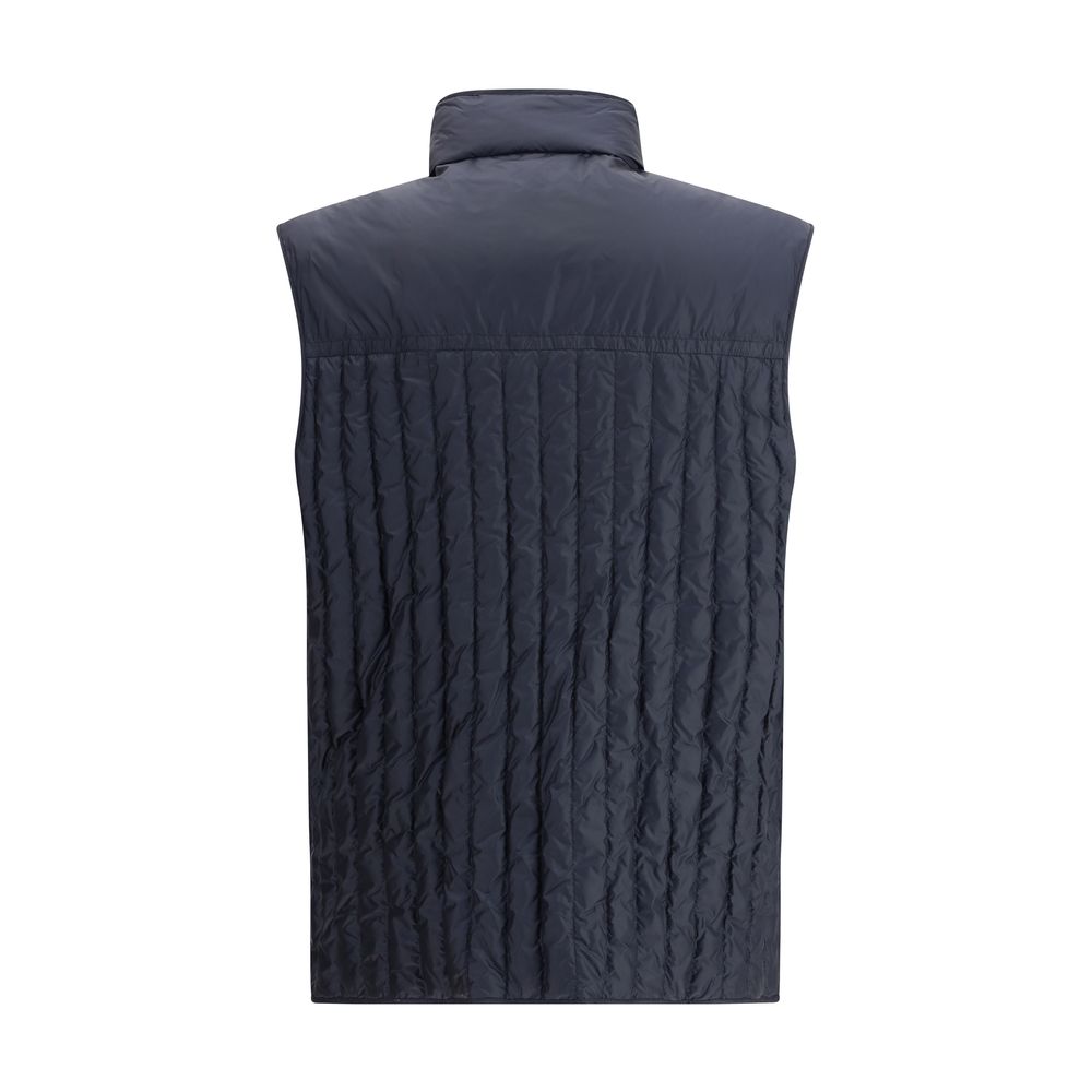 Blue Polyamide Sleveless JacketThe Moncler x Gilga Farm Down Vest by Donald Glover, named Tangerine after the orange groves of Gilga Farm, combines lightness and functionality. Crafted from longue saison, a lightweight and protective nylon, it features wa