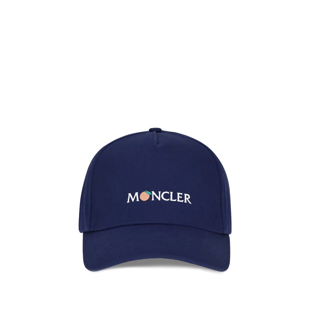Blue Cotton Cap (Baseball Hat)The Moncler x Gilga Farm by Donald Glover Baseball Cap is crafted from durable gabardine and features a creative reinterpretation of the logo. An essential yet distinctive style accessory that reflects the unique aesthetic of