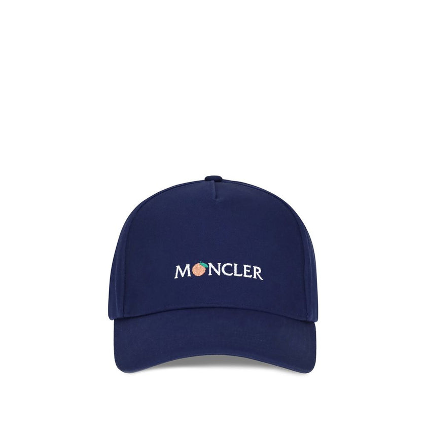 Blue Cotton Cap (Baseball Hat)The Moncler x Gilga Farm by Donald Glover Baseball Cap is crafted from durable gabardine and features a creative reinterpretation of the logo. An essential yet distinctive style accessory that reflects the unique aesthetic of