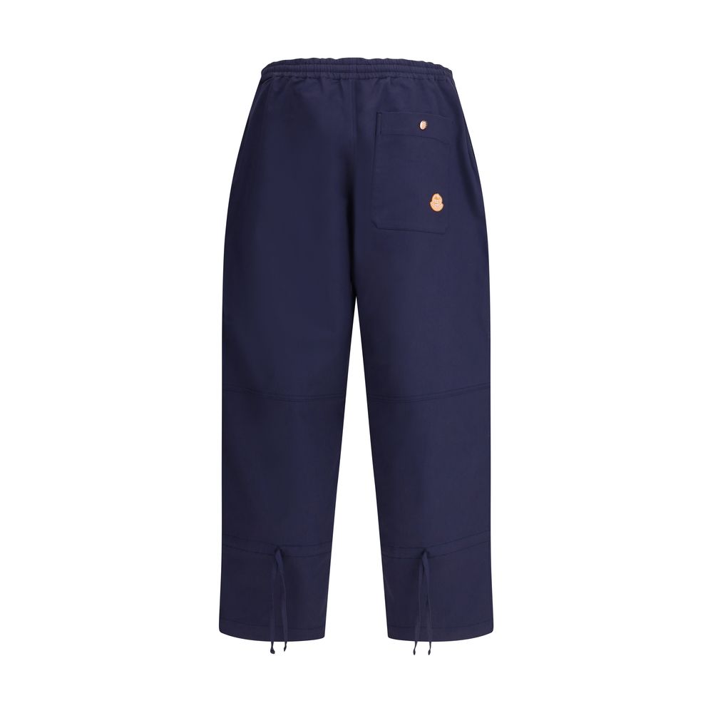 Blue Cotton Casual PantsThe Moncler x Gilga Farm cotton gabardine Pants by Donald Glover combine functionality with contemporary style. Part of the Moncler Genius line, they feature an elasticated waistband and two side welt pockets. A drawstring leg allo