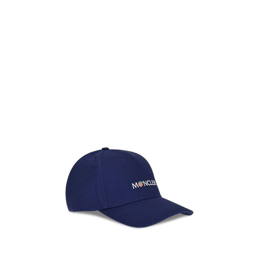 Blue Cotton Cap (Baseball Hat)The Moncler x Gilga Farm by Donald Glover Baseball Cap is crafted from durable gabardine and features a creative reinterpretation of the logo. An essential yet distinctive style accessory that reflects the unique aesthetic of