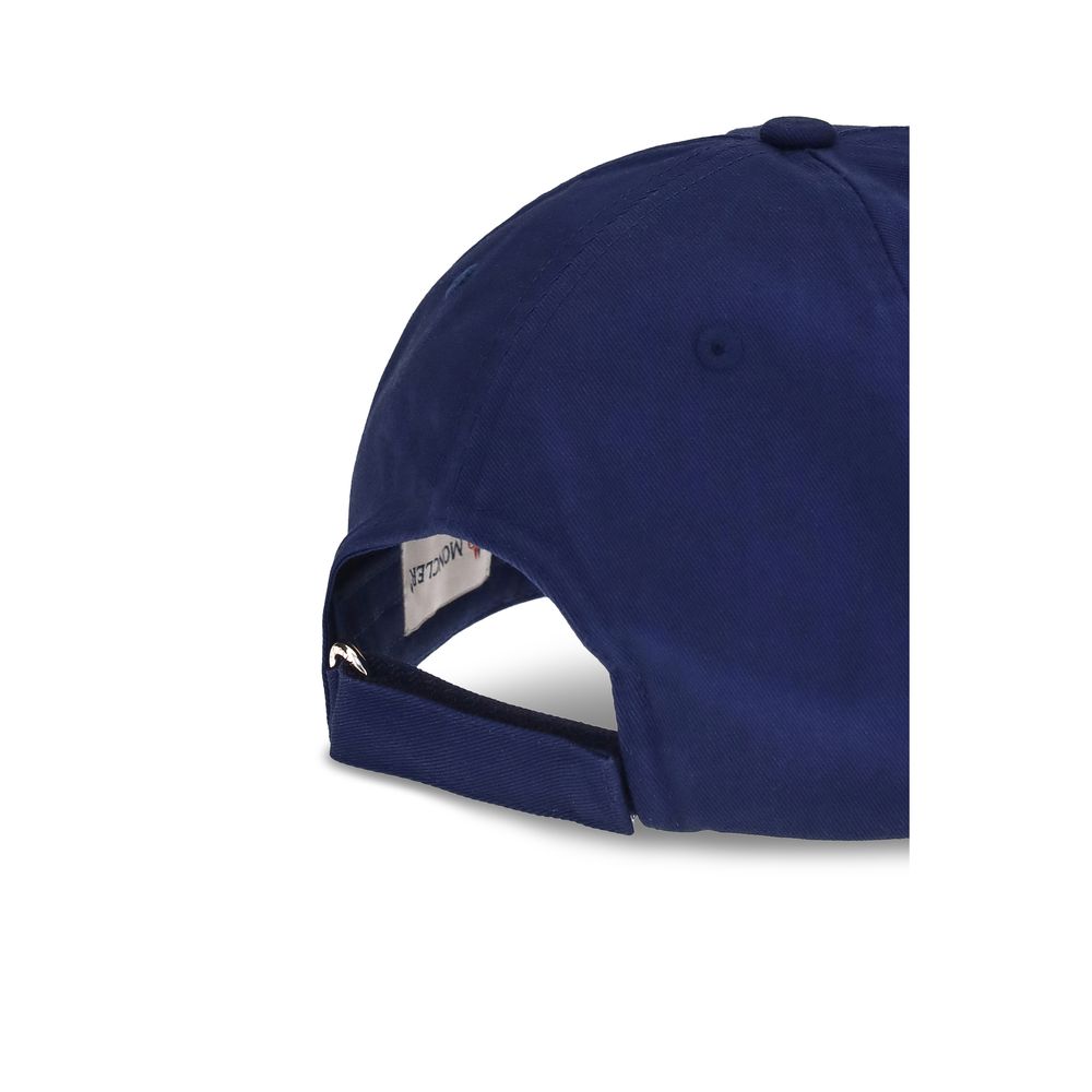 Blue Cotton Cap (Baseball Hat)The Moncler x Gilga Farm by Donald Glover Baseball Cap is crafted from durable gabardine and features a creative reinterpretation of the logo. An essential yet distinctive style accessory that reflects the unique aesthetic of