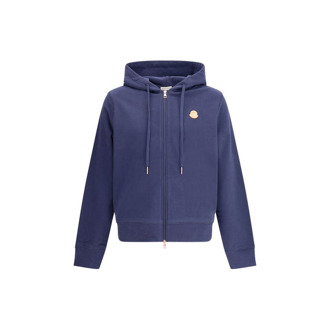 Blue Cotton SweatshirtThe Moncler x Gilga Farm Zip-Up Hoodie by Donald Glover pays homage to the orange groves of Gilga Farm, where the fruit is reinvented as a distinctive logo. Crafted from soft cotton fleece, it features an adjustable drawstring hood a