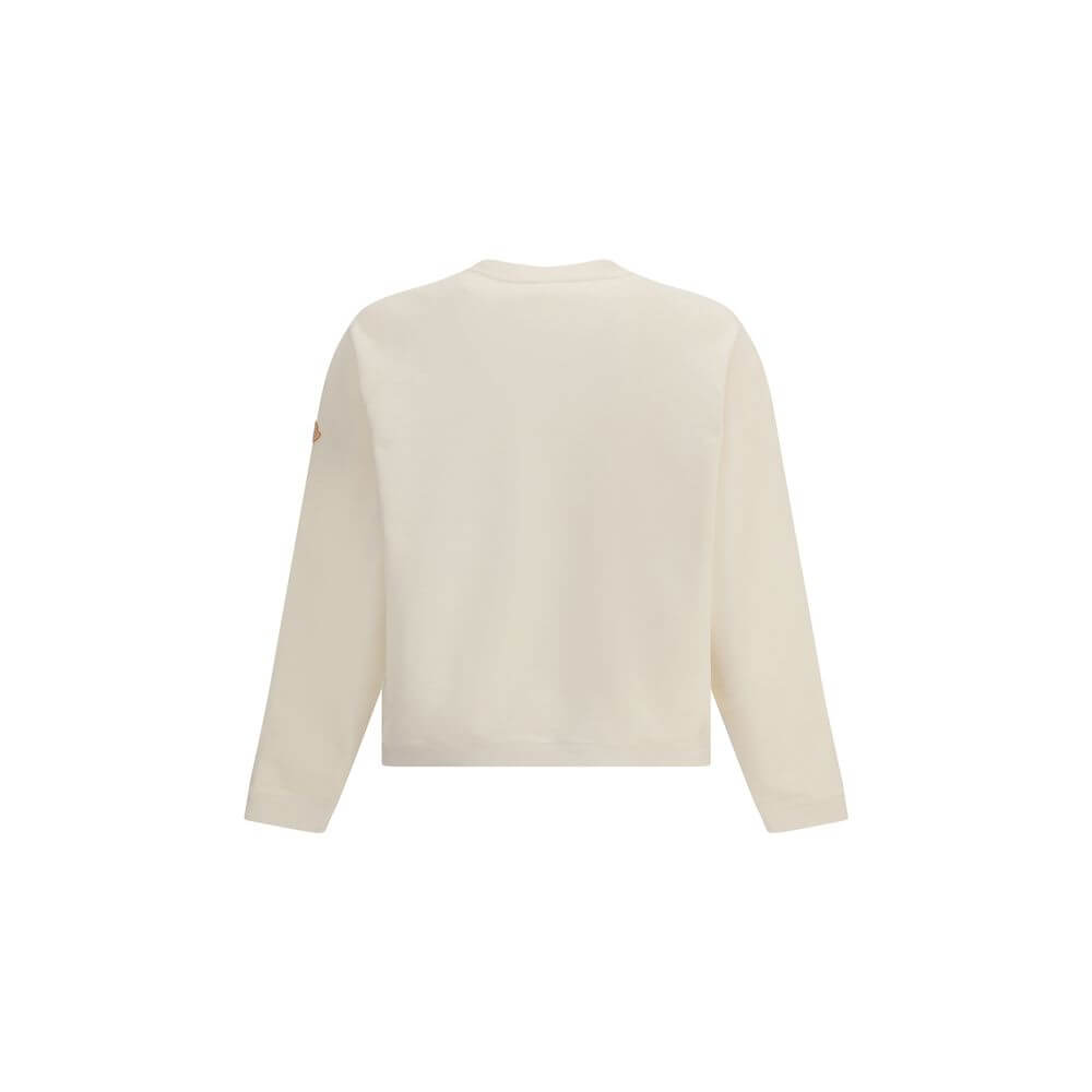 Moncler x Gilga Farm by Donald Glover cotton SweatshirtDonald Glover’s Moncler x Gilga Farm Cotton Sweatshirt playfully celebrates the brand’s mascot during a visit to Gilga Farm. Crafted from soft cotton fleece, this crewneck sweatshirt combines comfort