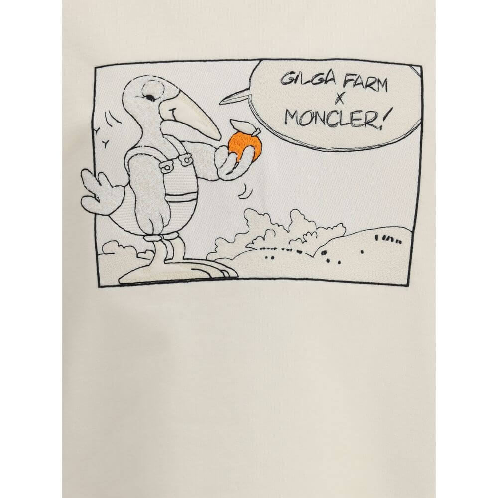 Moncler x Gilga Farm by Donald Glover cotton SweatshirtDonald Glover’s Moncler x Gilga Farm Cotton Sweatshirt playfully celebrates the brand’s mascot during a visit to Gilga Farm. Crafted from soft cotton fleece, this crewneck sweatshirt combines comfort