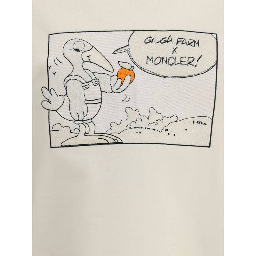 Moncler x Gilga Farm by Donald Glover cotton SweatshirtDonald Glover’s Moncler x Gilga Farm Cotton Sweatshirt playfully celebrates the brand’s mascot during a visit to Gilga Farm. Crafted from soft cotton fleece, this crewneck sweatshirt combines comfort