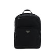 Black Nylon BackpackRe-Nylon backpack by Prada, handle on leather top, adjustable shoulder straps, padded mesh back, zippered top closure, interior slit pocket with zipper closure, interior patch pocket, two exterior zippered pockets, contrasting iconic m