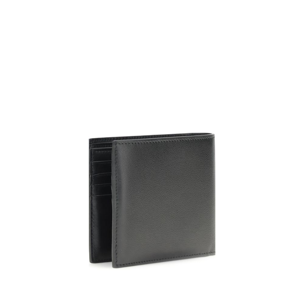 Black Calf Leather Bos Taurus WalletBalenciaga’s Logo plaque Wallet combines elegance and functionality in a compact, sophisticated design. Featuring eight card slots and a bill compartment, it is perfect for everyday organization. On the inside, the gold
