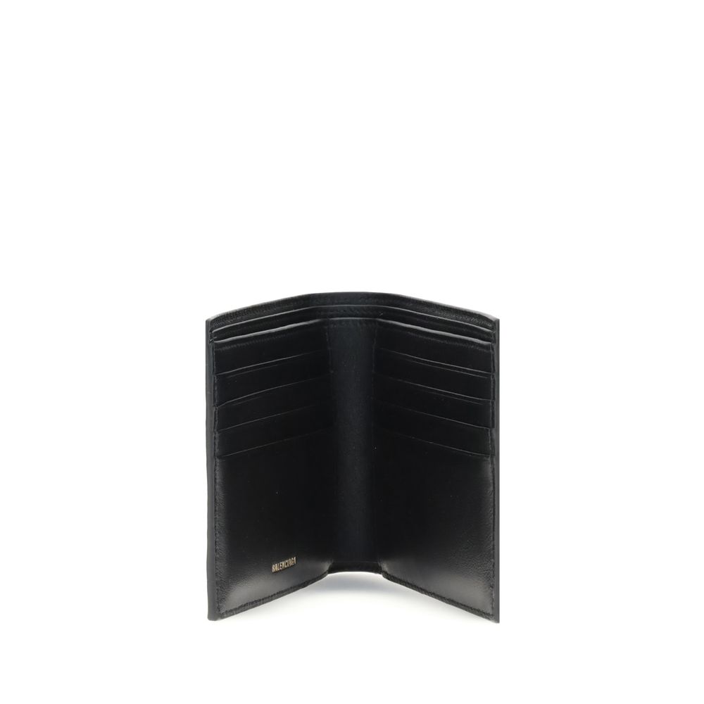 Black Calf Leather Bos Taurus WalletBalenciaga’s Logo plaque Wallet combines elegance and functionality in a compact, sophisticated design. Featuring eight card slots and a bill compartment, it is perfect for everyday organization. On the inside, the gold