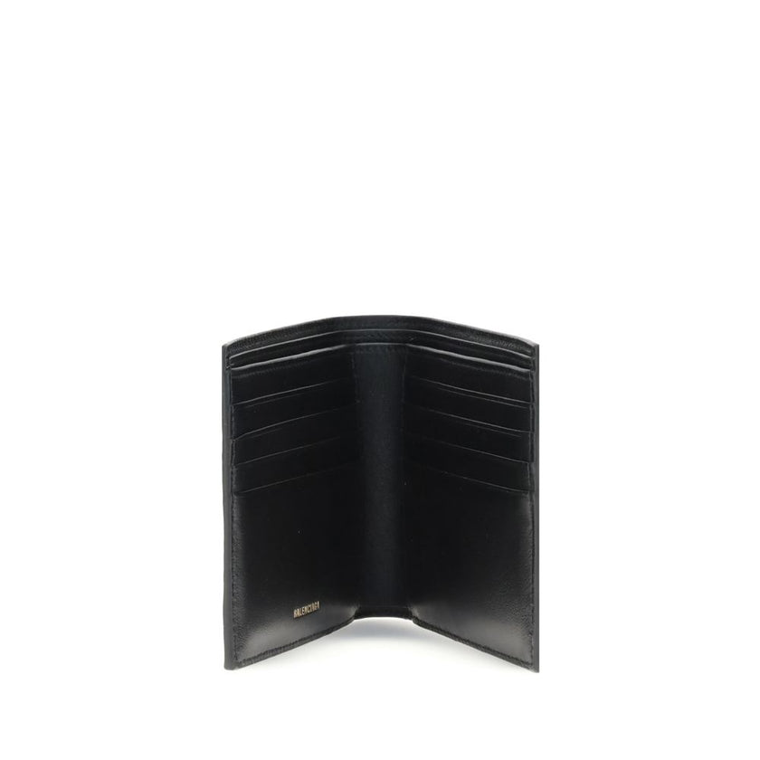 Black Calf Leather Bos Taurus WalletBalenciaga’s Logo plaque Wallet combines elegance and functionality in a compact, sophisticated design. Featuring eight card slots and a bill compartment, it is perfect for everyday organization. On the inside, the gold