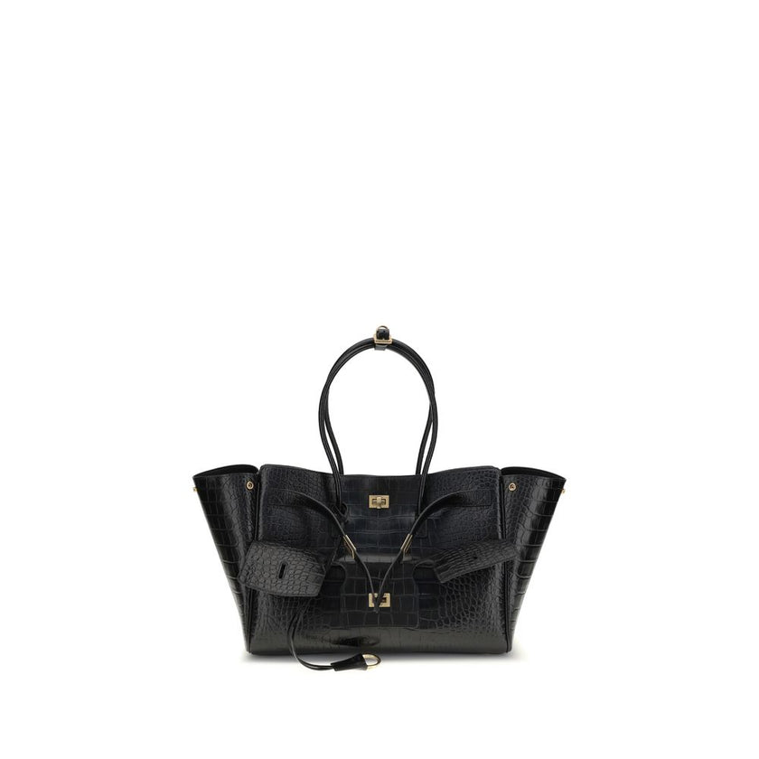 Black Calf Leather Bos Taurus Shoulder BagBalenciaga’s Bel Air medium Shoulder Bag is a sophisticated accessory in crocodile-effect calfskin leather. A versatile carry all, it can be carried either on the shoulder or in the hand thanks to the two handles