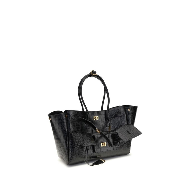 Black Calf Leather Bos Taurus Shoulder BagBalenciaga’s Bel Air medium Shoulder Bag is a sophisticated accessory in crocodile-effect calfskin leather. A versatile carry all, it can be carried either on the shoulder or in the hand thanks to the two handles