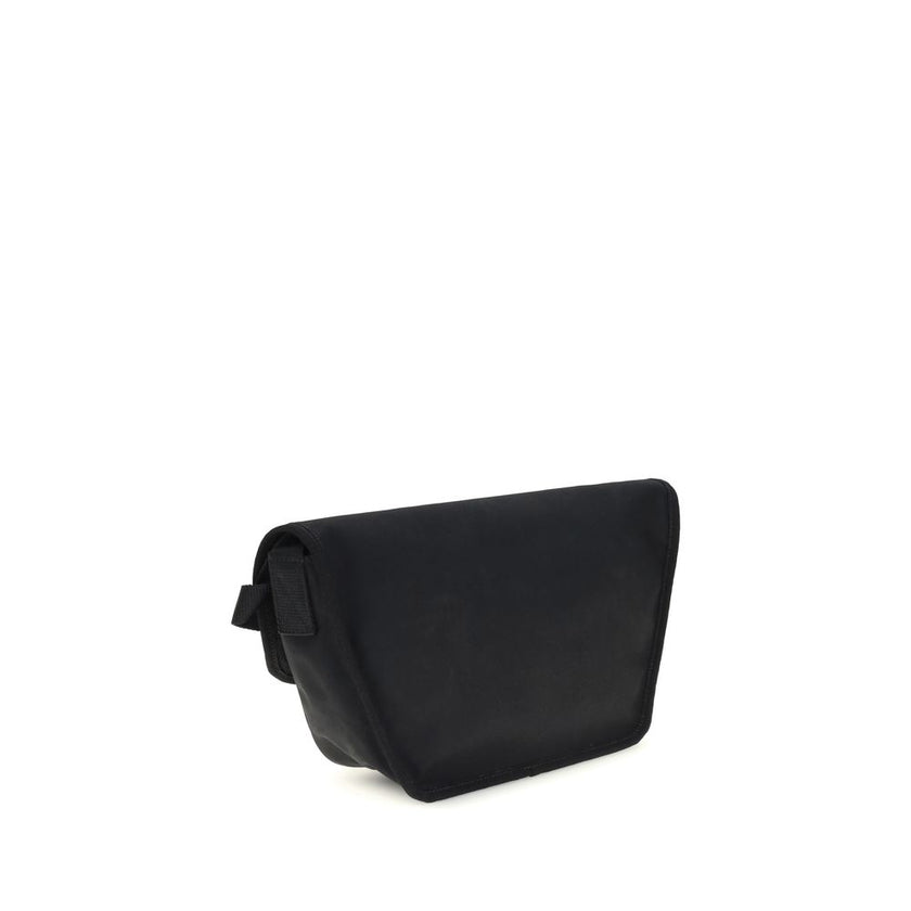 Black Polyamide Shoulder BagBalenciaga’s Explorer small Shoulder Bag is made of polyamide and polyester with a washed-out effect with a vintage character. This messenger model can be carried either over the shoulder or cross-body, thanks to the adjustable